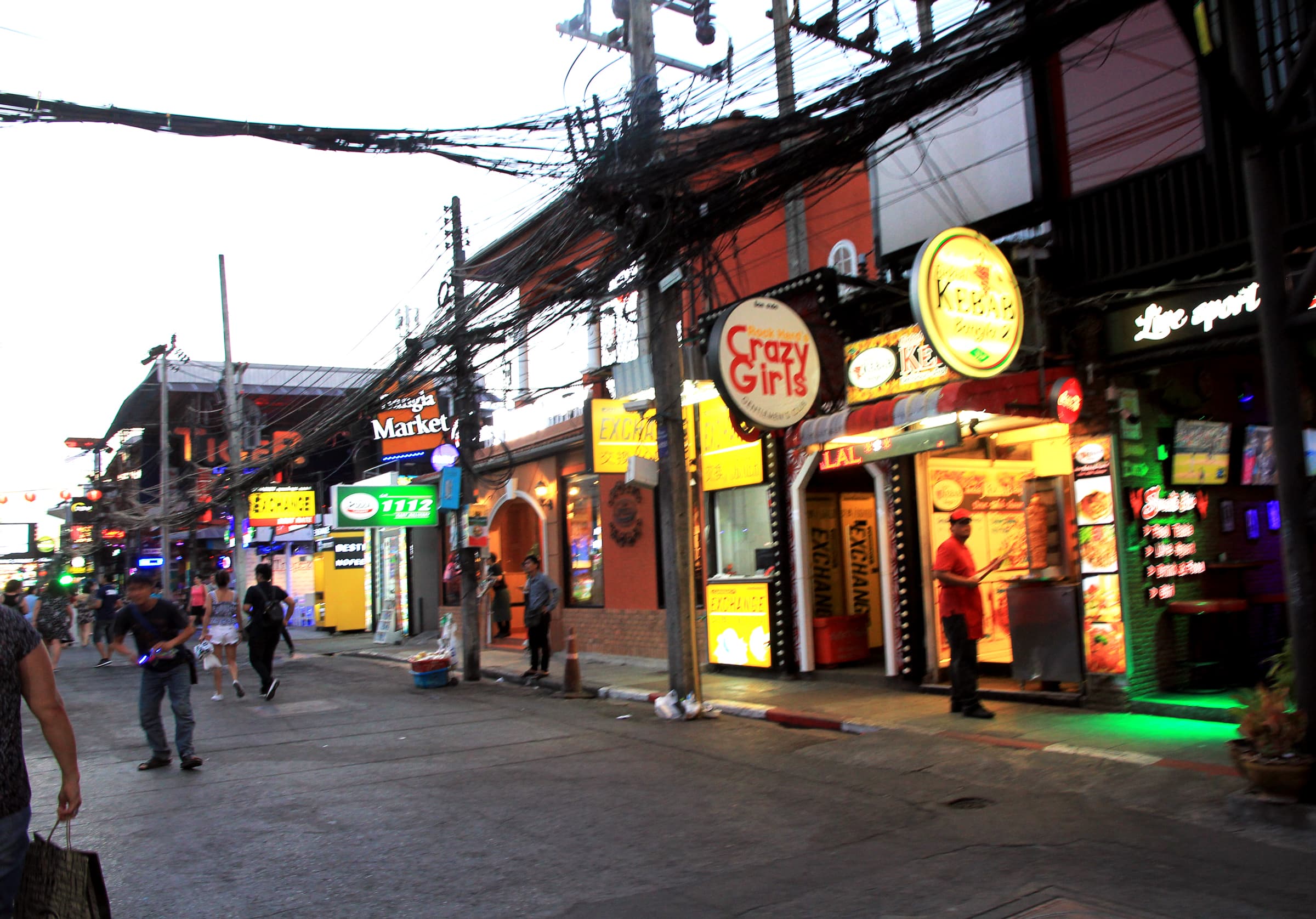 Bangla Road in Patong at dusk as the pedestrian nightlife street opens