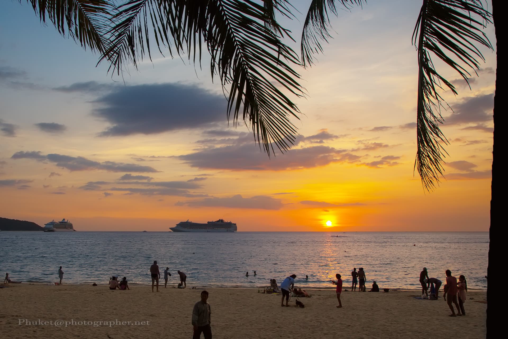 Sunset over Patong Beach with beachfront venues